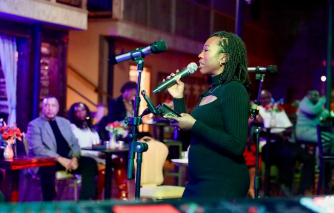 Yaya's Juke Joint host on stage